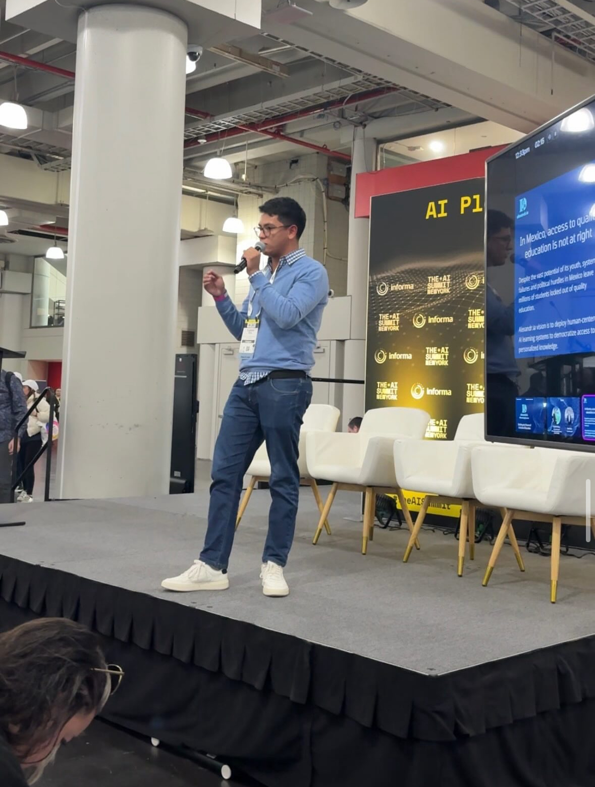 Eugenio Salas speaking on stage at The AI Summit in New York